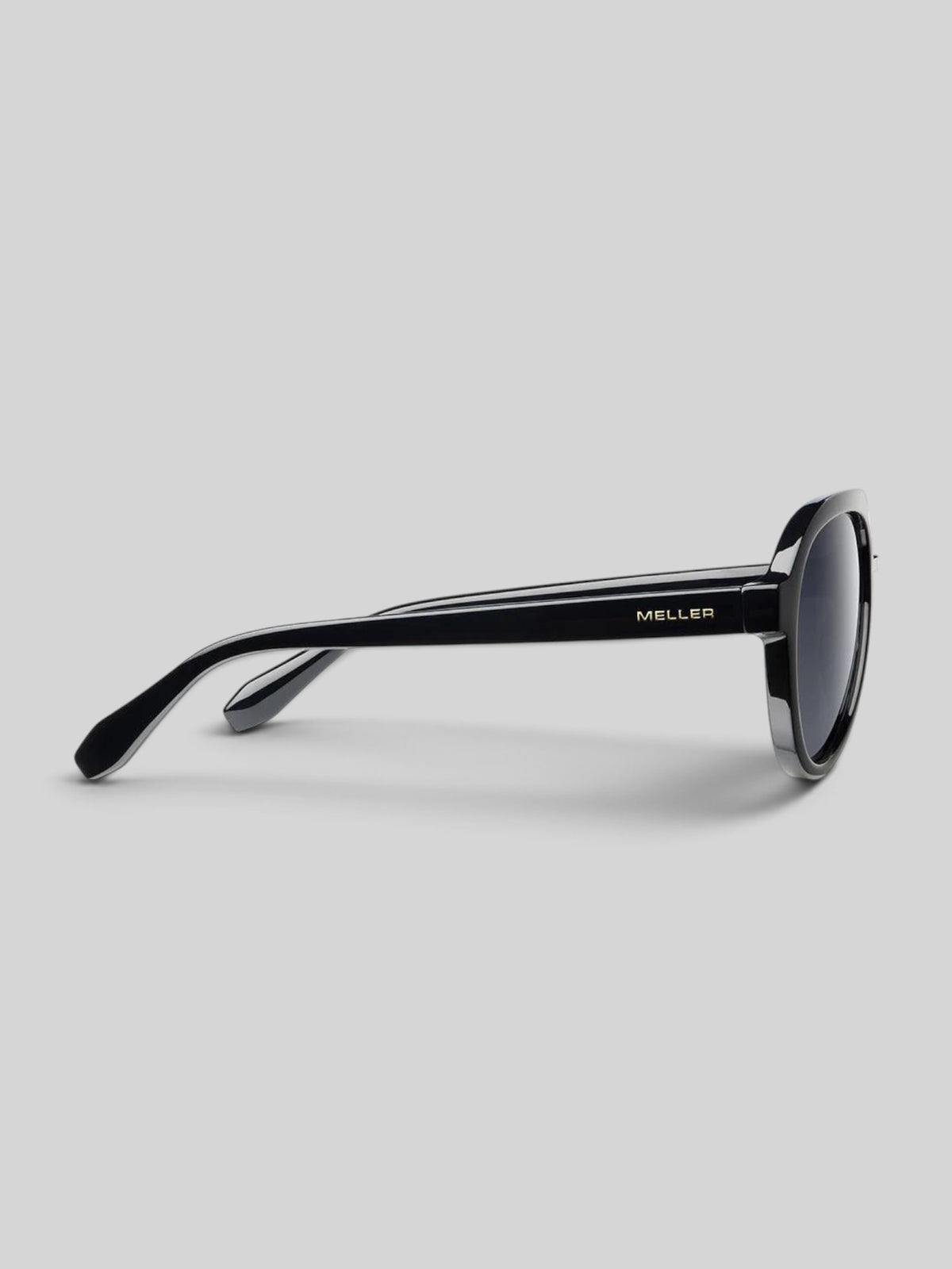 Baffle Haus KENA black aviator sunglasses with polarized lenses and bio-based frames, side profile view.