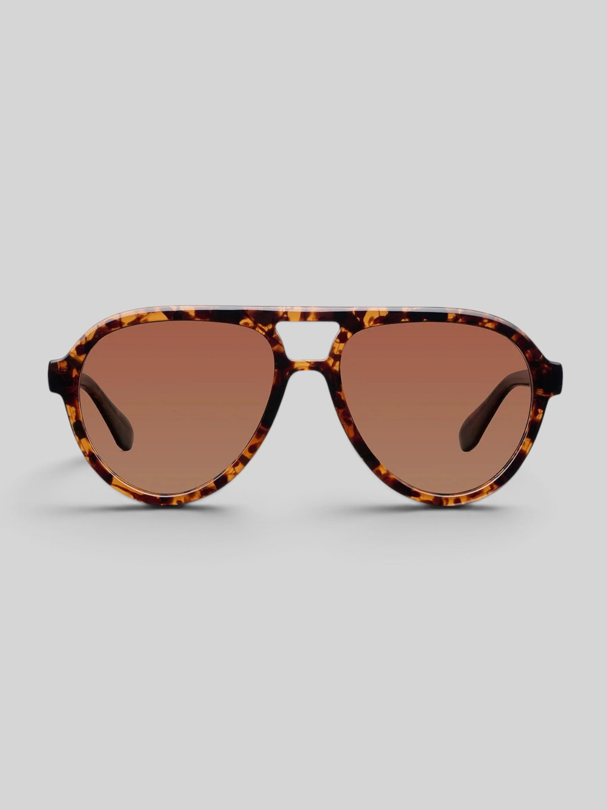 Baffle Haus KENA sunglasses in Tigris brown with a modern aviator frame, double bridge, and polarized lenses.