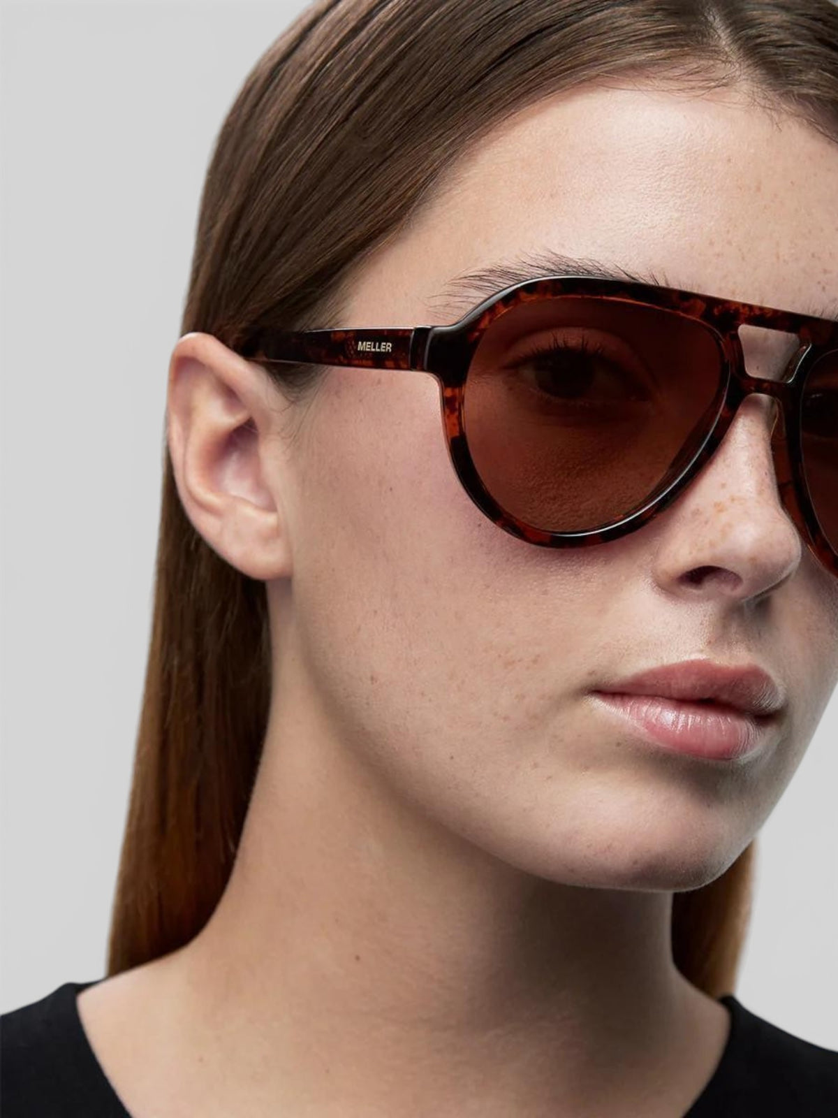 Baffle Haus KENA aviator sunglasses in Tigris brown with polarized lenses worn by a woman