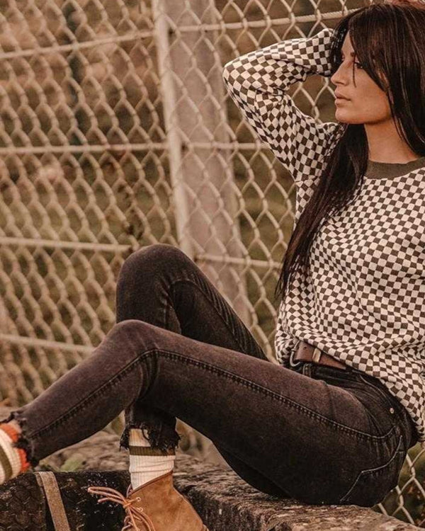 Baffle Haus Wildust vintage khaki knitted jumper with a black and white checkerboard pattern and ribbed collar