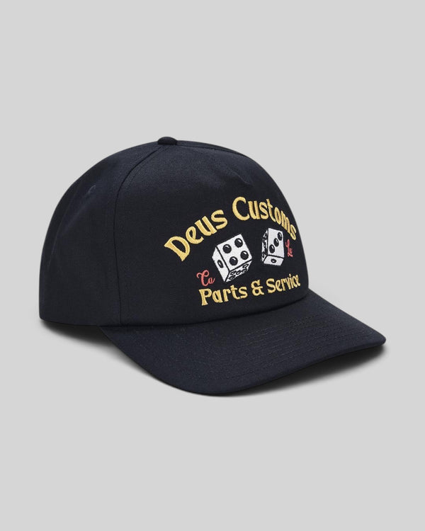 Baffle Haus Knucklebones black cotton twill cap with vintage-inspired Deus Customs dice embroidery and snap closure