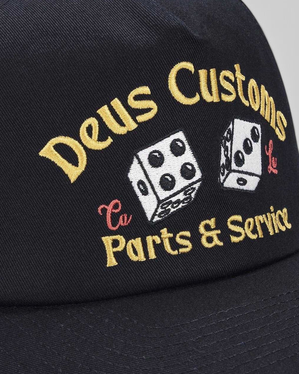 Baffle Haus Knucklebones cap in black cotton twill with vintage-inspired Deus Customs dice embroidery