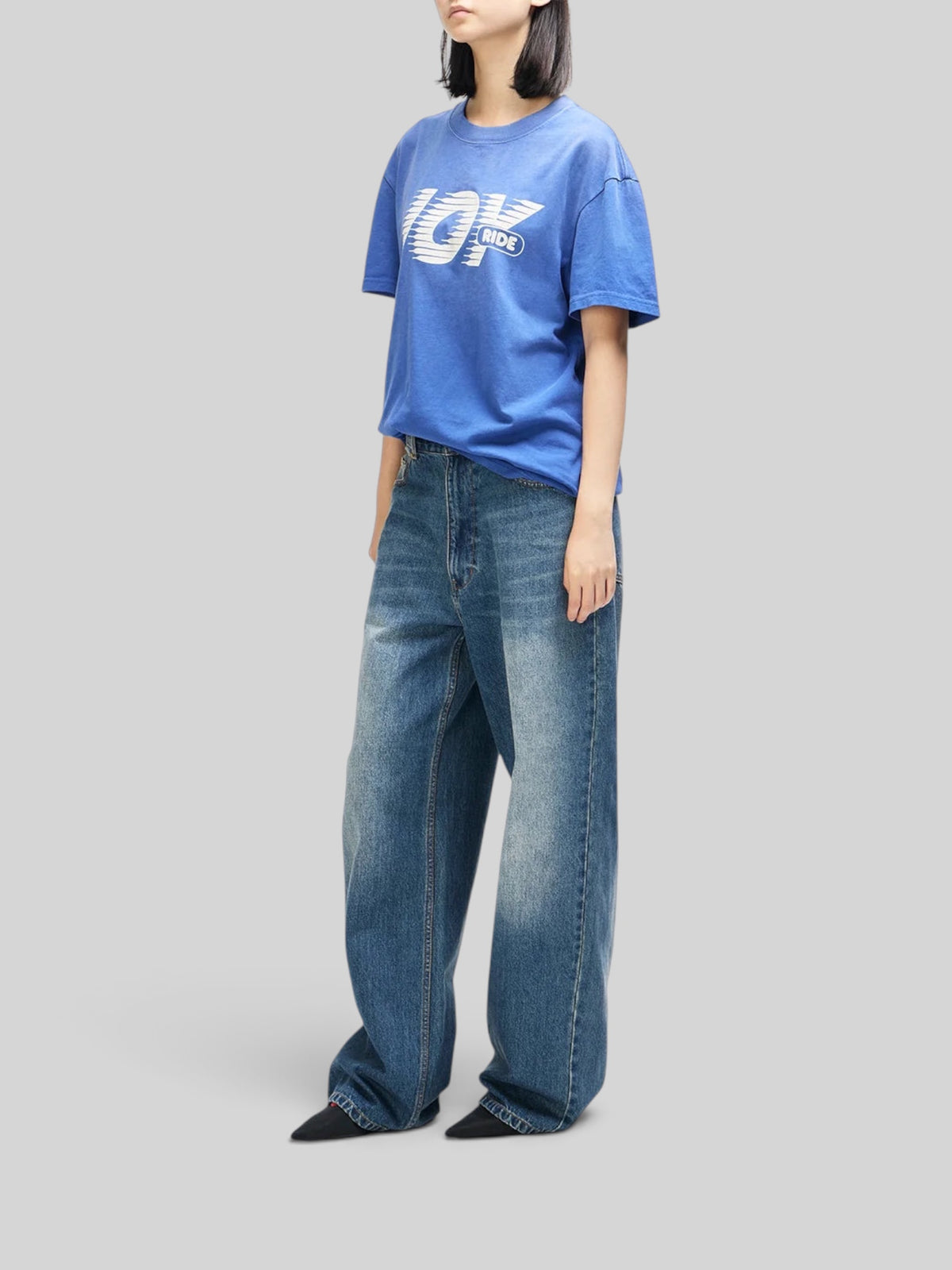 Baffle Haus vintage fit Limoges blue recycled cotton t-shirt with graphic chest print worn with baggy denim jeans