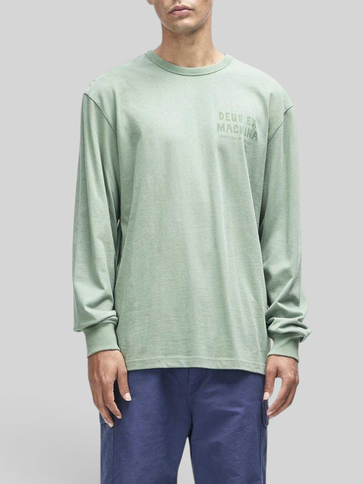Baffle Haus Kumbaya long sleeve tee in loden frost green with chest graphic print, made from cotton nylon jersey.