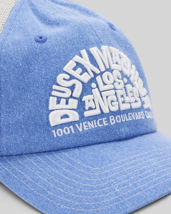Baffle Haus Los Angeles Address trucker hat in Bonnie Blue with white embroidered text and contrast stitching.