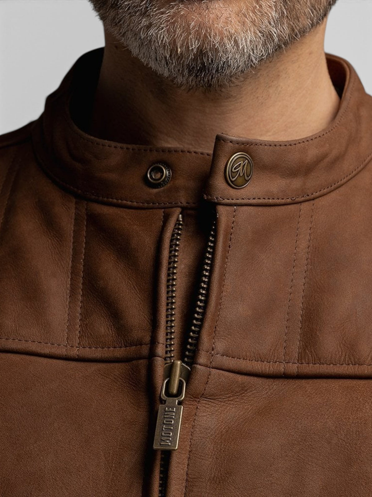 Baffle Haus Motone Shōgun mahogany nubuck leather motorcycle jacket featuring quilted chest panels and brass hardware