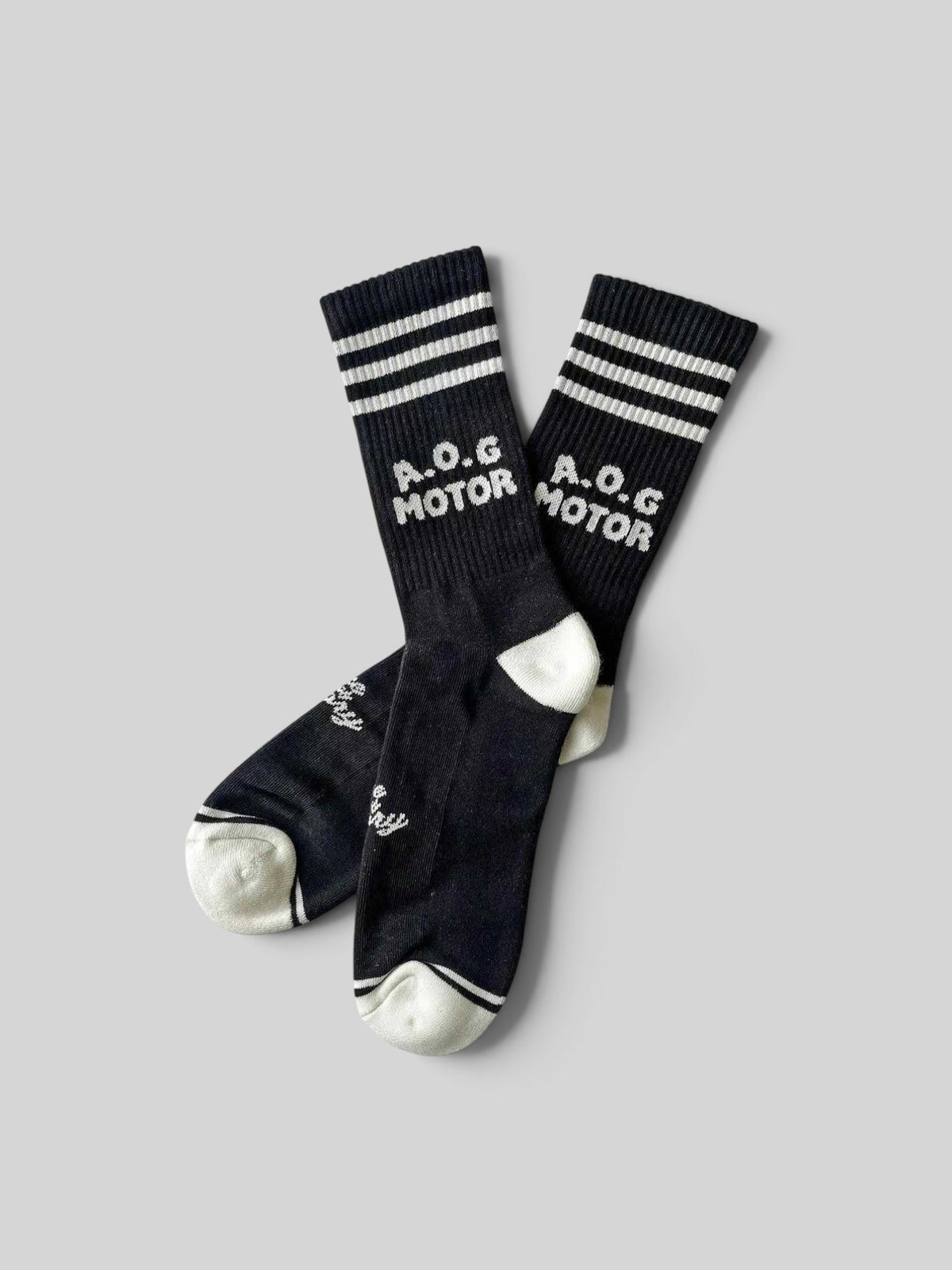Baffle Haus Age Of Glory Marauder black and off-white cotton motorcycle socks with striped cuffs and logo detail