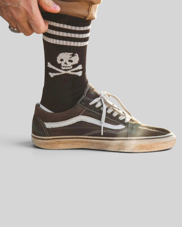 Baffle Haus Age Of Glory Marauder black cotton socks with white skull and crossbones graphic and striped cuff