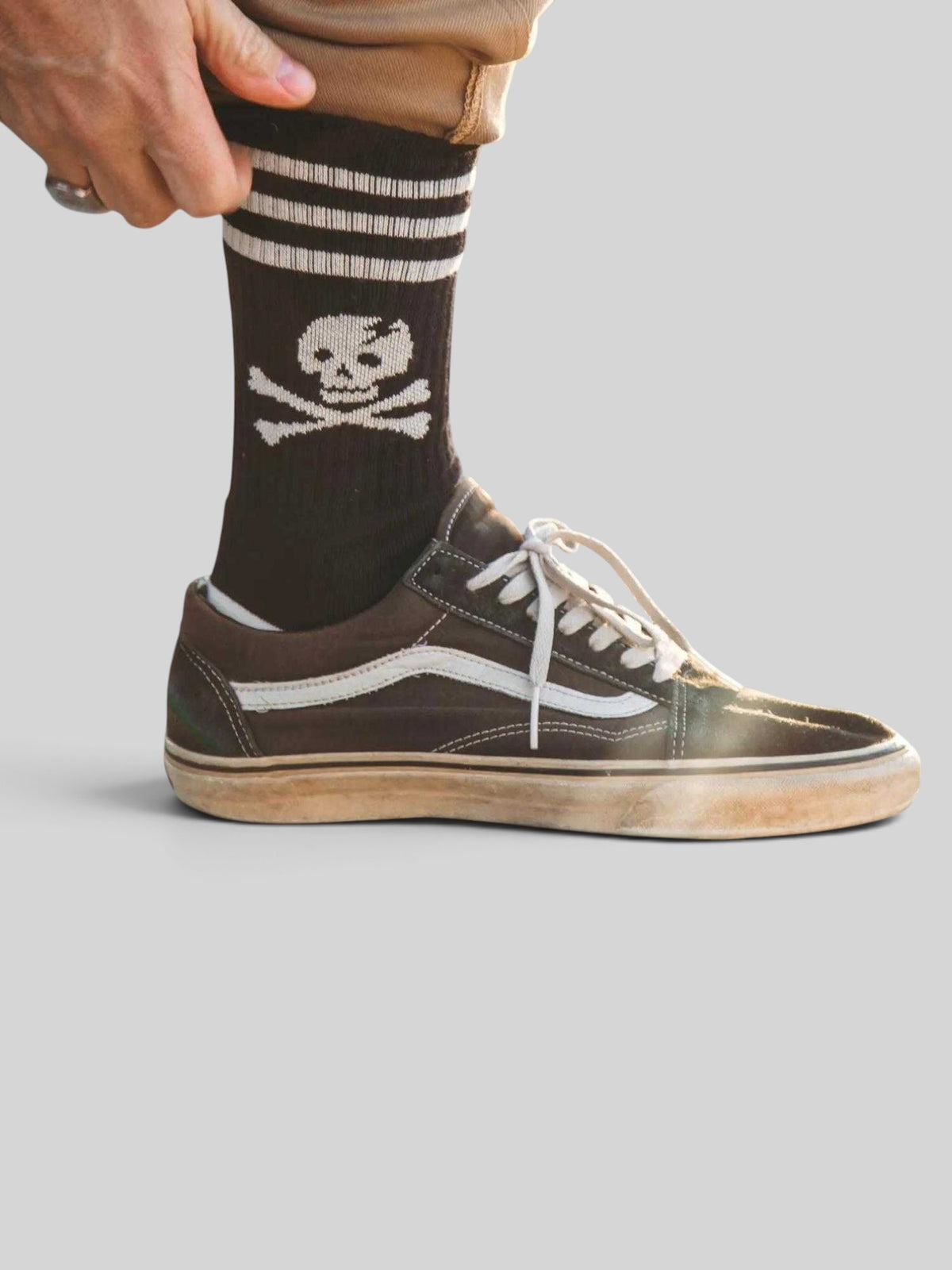 Baffle Haus Age Of Glory Marauder black cotton socks with white skull and crossbones graphic and striped cuff