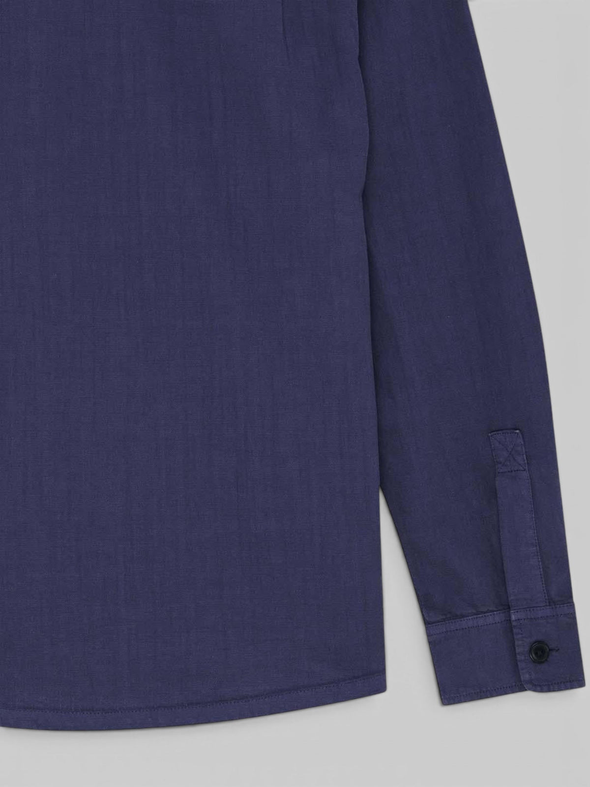 Baffle Haus Vacay Chambray Shirt in mechanic blue cotton with long sleeves and buttoned cuffs
