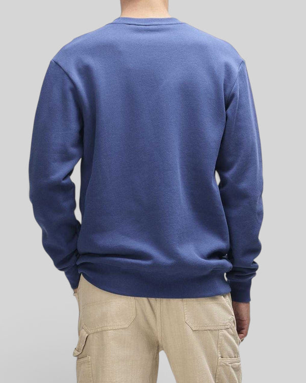 Baffle Haus Trafalgar Crew mechanic blue organic cotton fleece sweatshirt, back view on a model