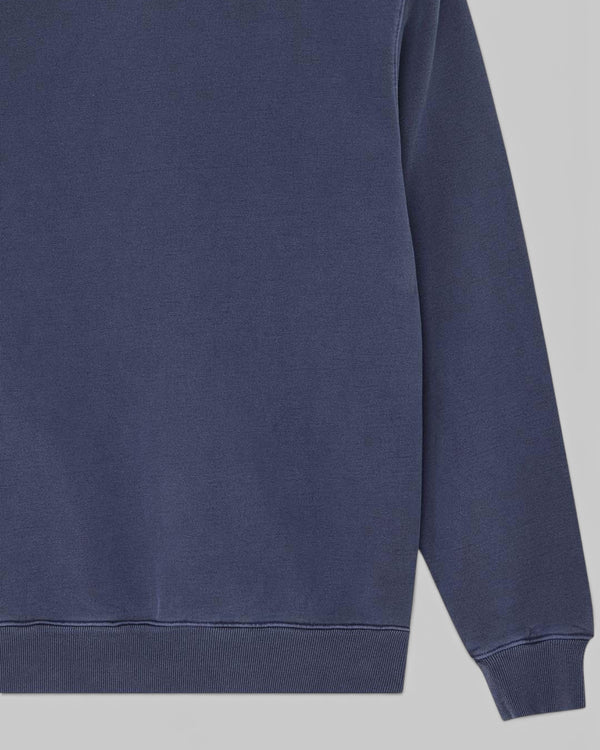 Baffle Haus Deus Shield crew neck sweatshirt in mechanic blue heavyweight loop back fleece with garment dyed finish