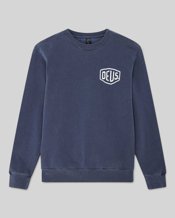 Baffle Haus Deus Shield crew neck sweatshirt in mechanic blue with white chest logo and heavyweight fleece fabric