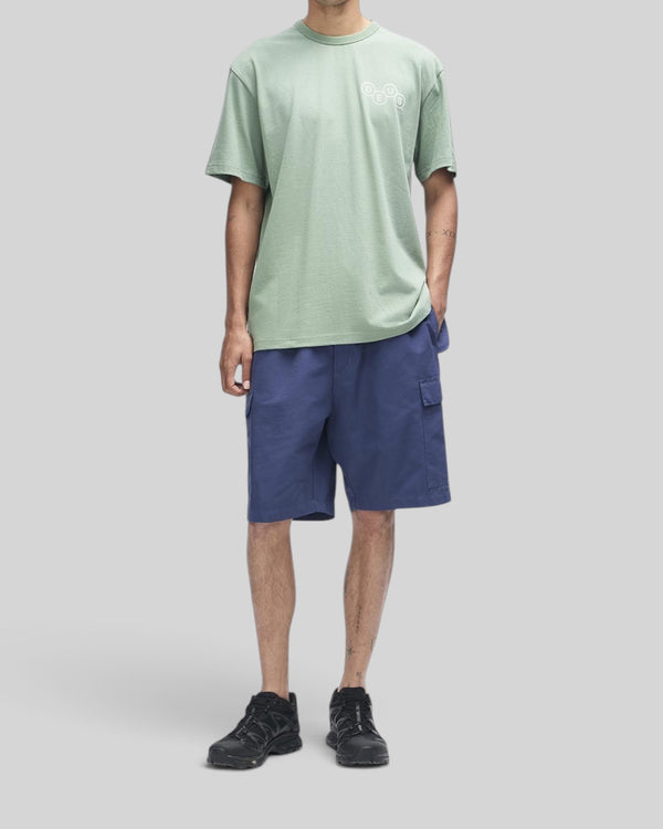 Baffle Haus Mechanism Tee in loden frost green, featuring a regular fit and chest graphic on organic cotton jersey.