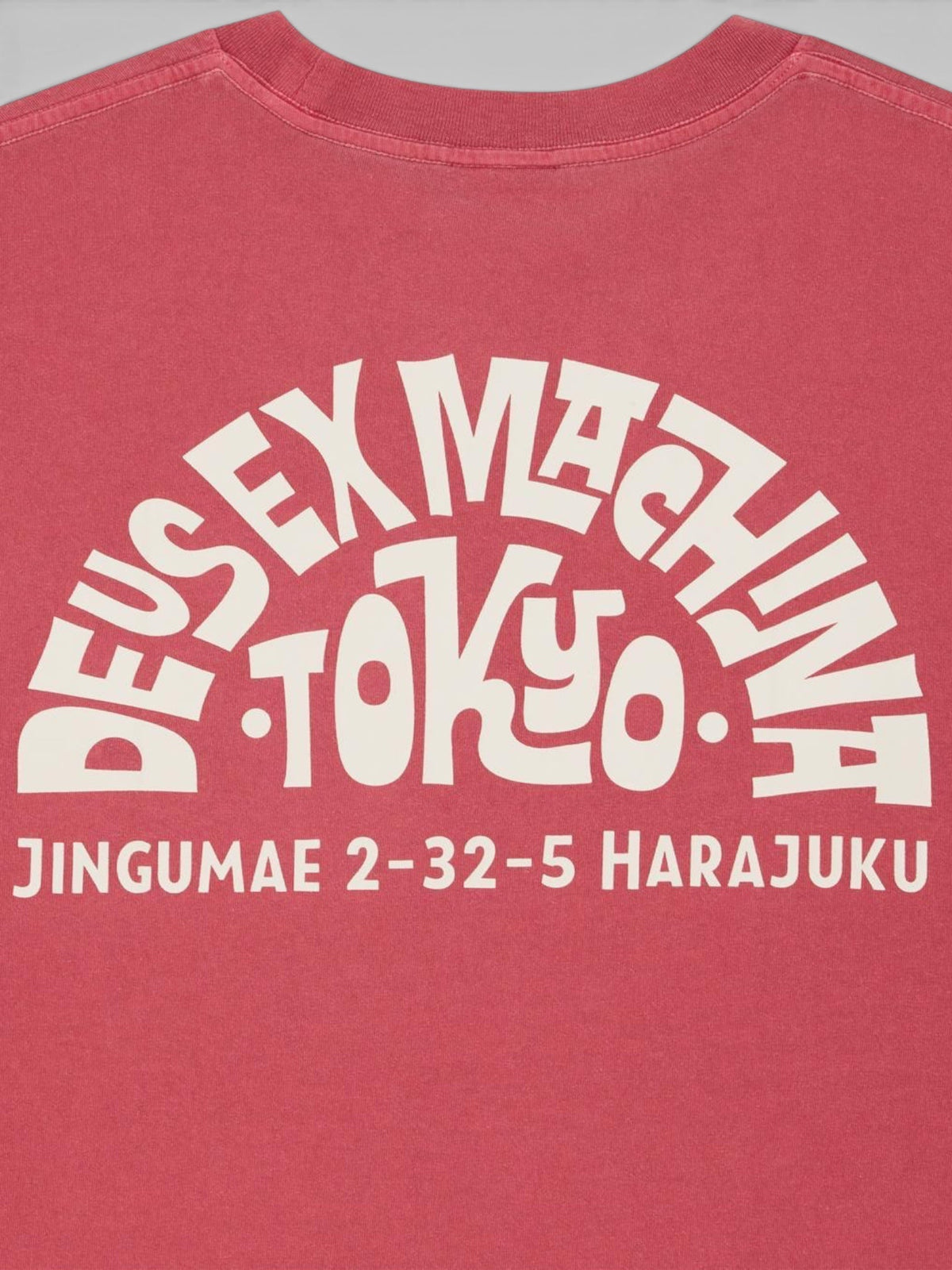 Baffle Haus Tokyo Address Tee in melon red recycled cotton with white graphic print on the back