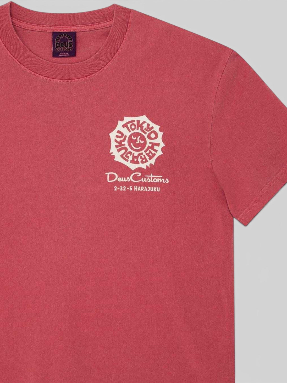 Baffle Haus Tokyo Address t-shirt in melon red recycled cotton with white chest graphic print