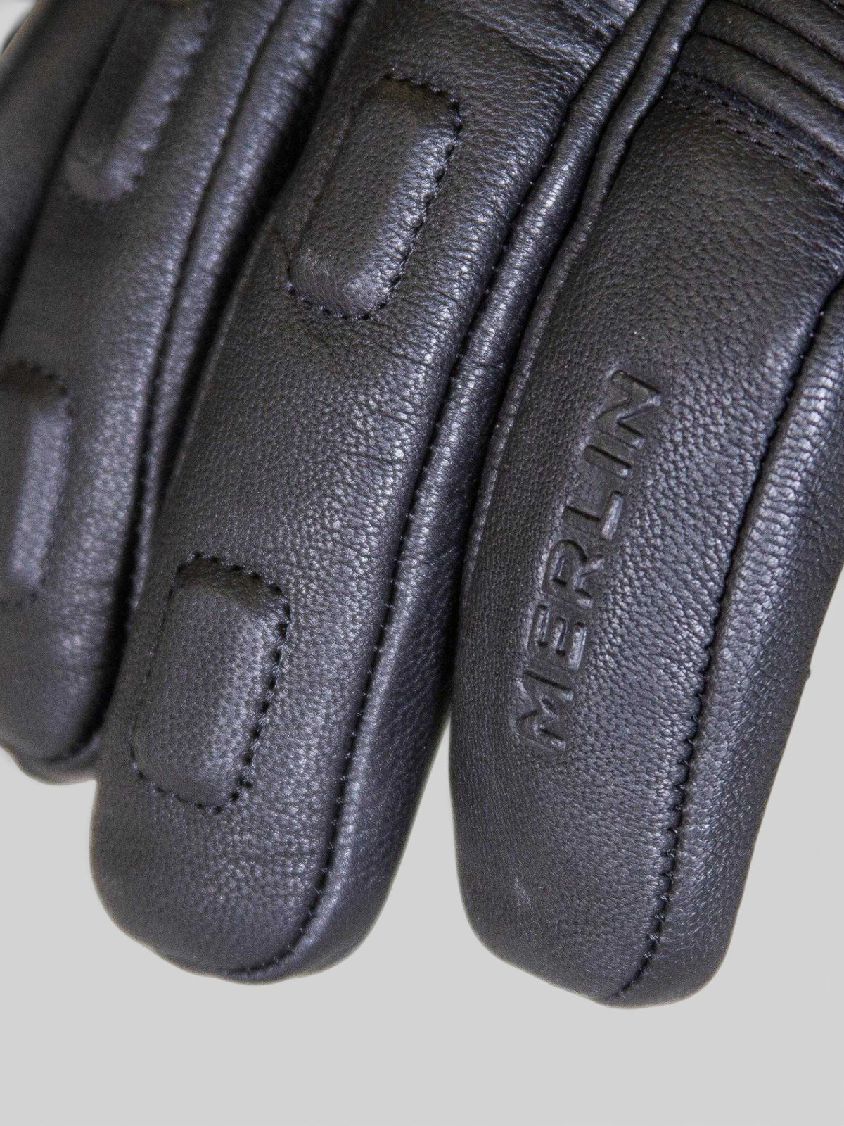 Baffle Haus Merlin Calton black leather motorcycle glove featuring padded knuckle protection and embossed branding