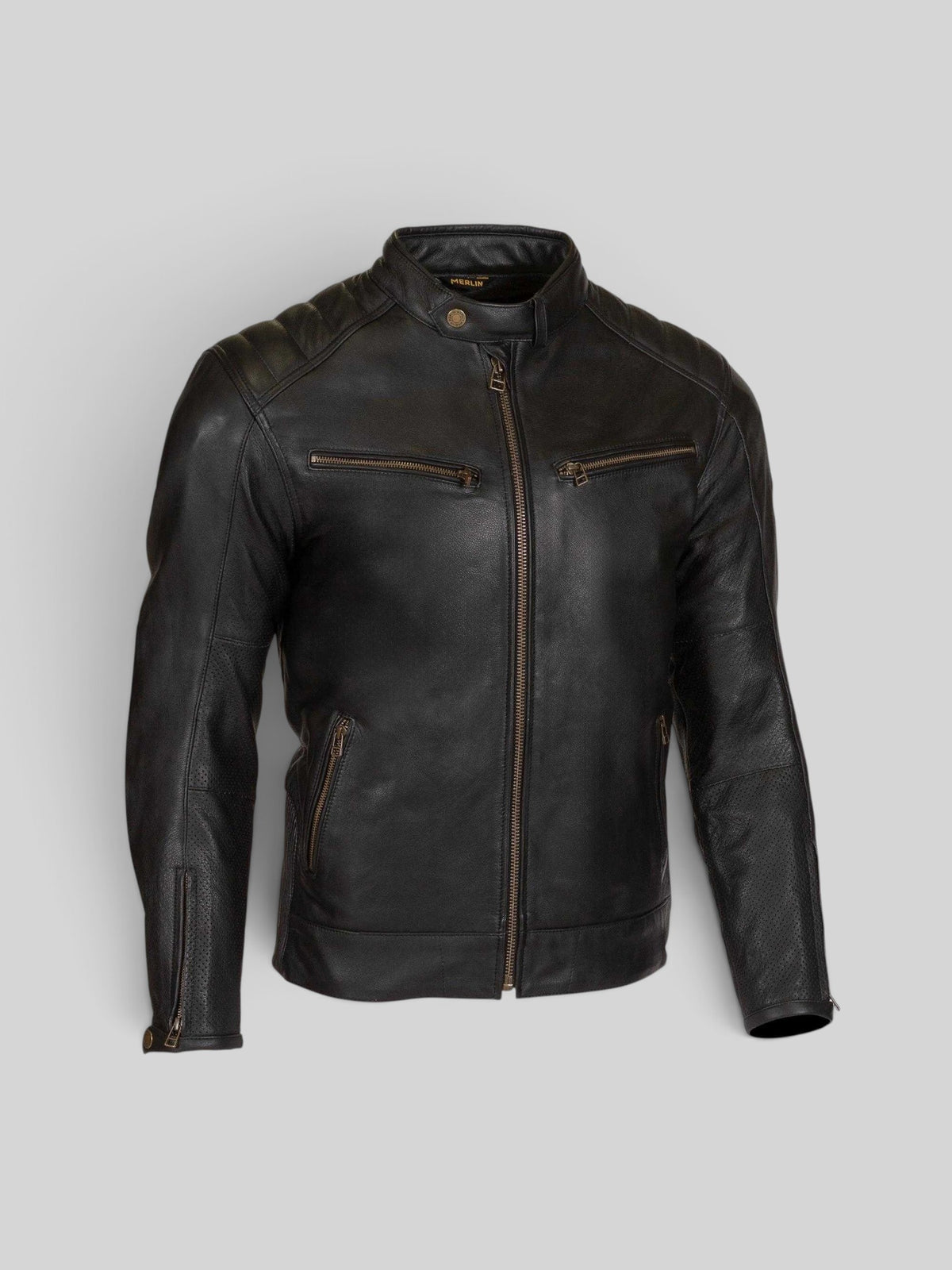 Baffle Haus Merlin Chase D30 black cowhide leather motorcycle jacket with antique brass zippers and perforated panels.