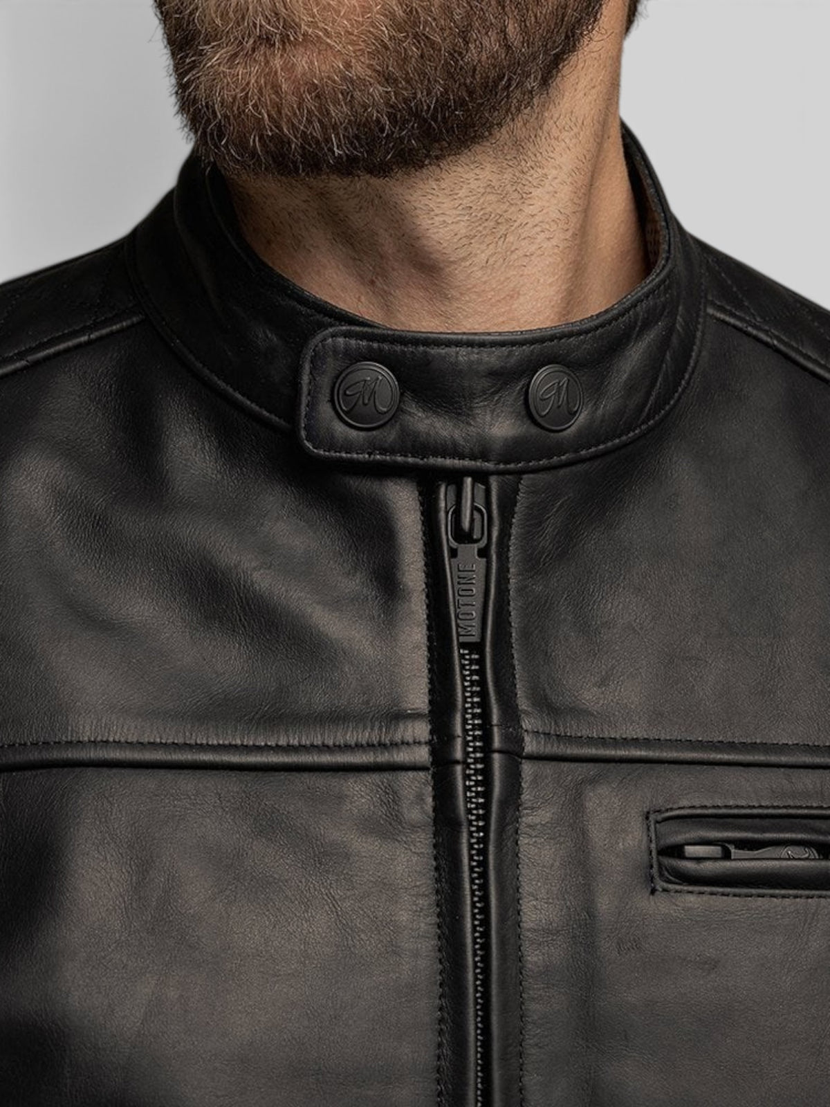 Baffle Haus Motone Revolver black cowhide leather motorcycle jacket with a snap-button collar and front zipper