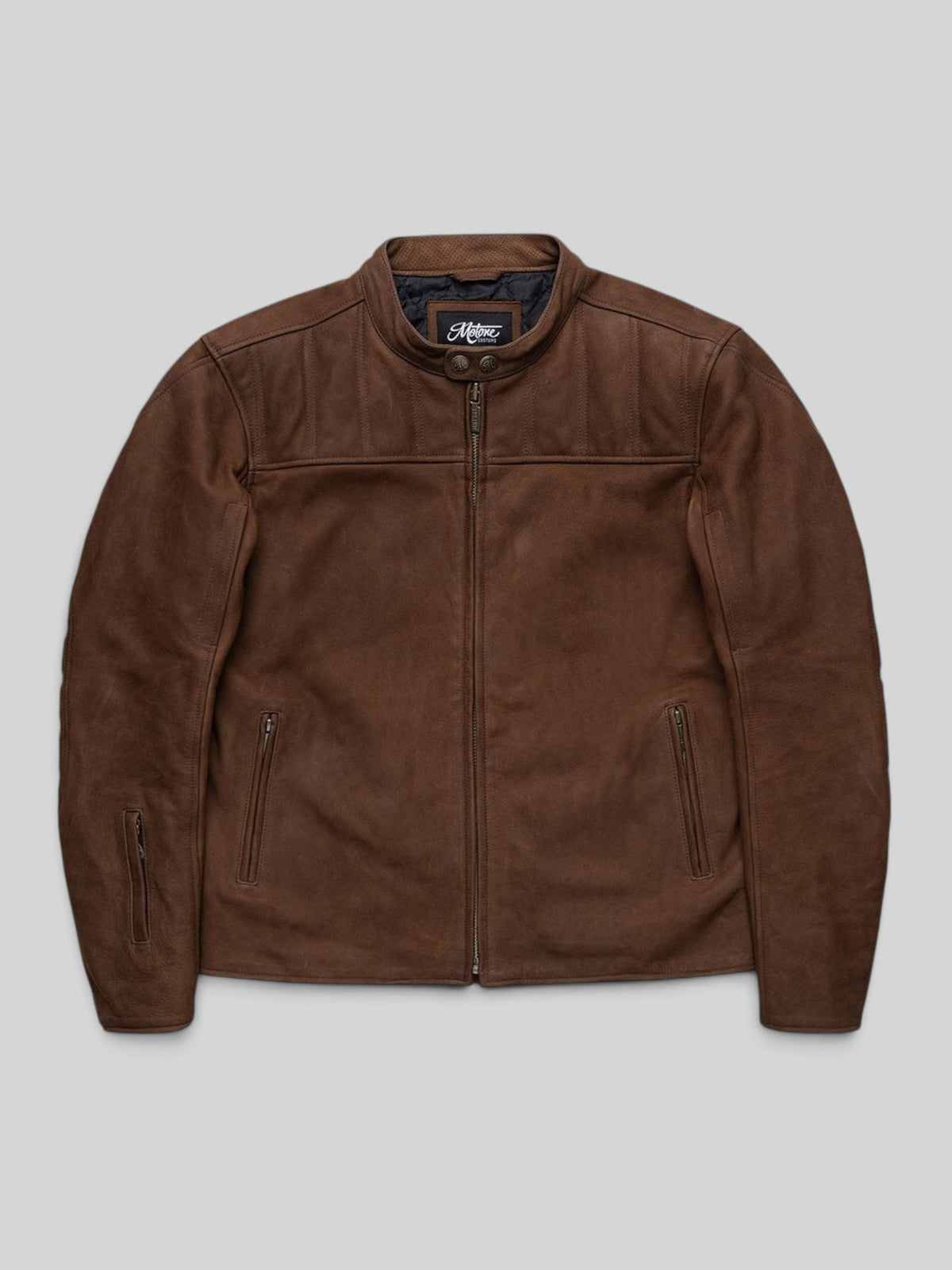 Baffle Haus Motone Shogun mahogany nubuck leather motorcycle jacket with quilted chest panels and brass hardware.