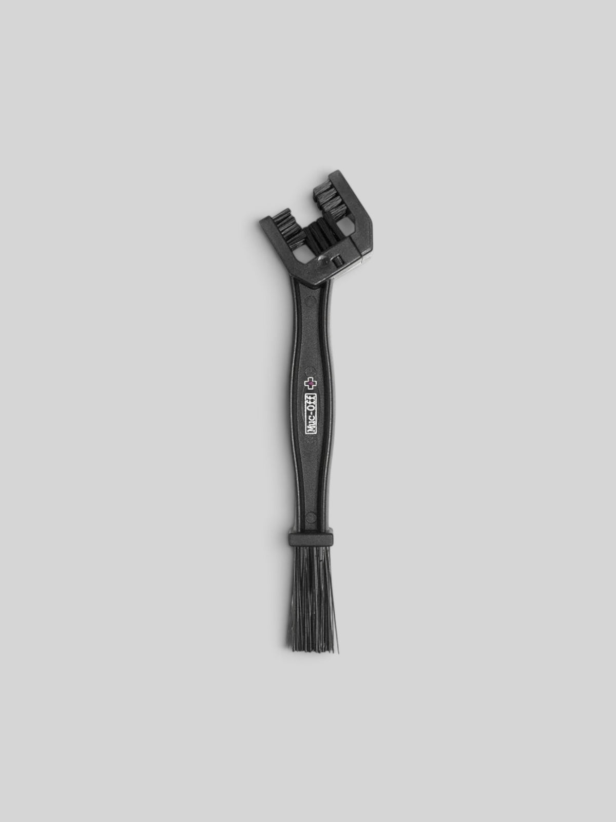 Baffle Haus black motorcycle chain cleaning brush with multi-sided bristles for drivetrain maintenance