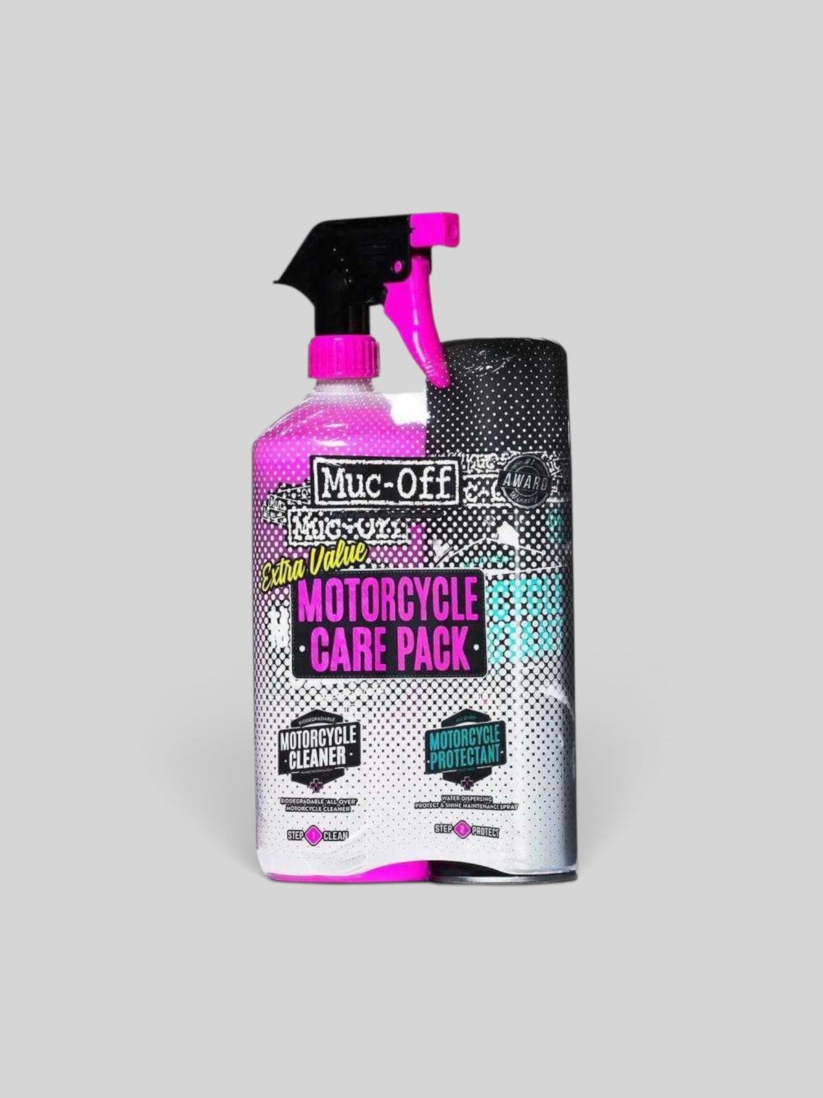 Baffle Haus Muc-Off Motorcycle Duo Care Kit featuring a pink cleaner spray bottle and a protective aerosol spray can.