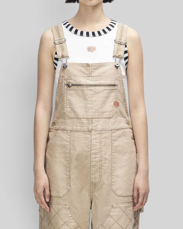 Baffle Haus Mouton Overalls in safari beige organic cotton moleskin with front patch pockets and quilted knee detail.