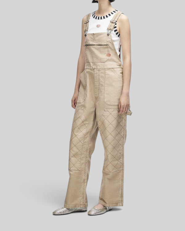Baffle Haus Mouton overalls in safari beige organic cotton moleskin with quilted knees and front patch pockets.