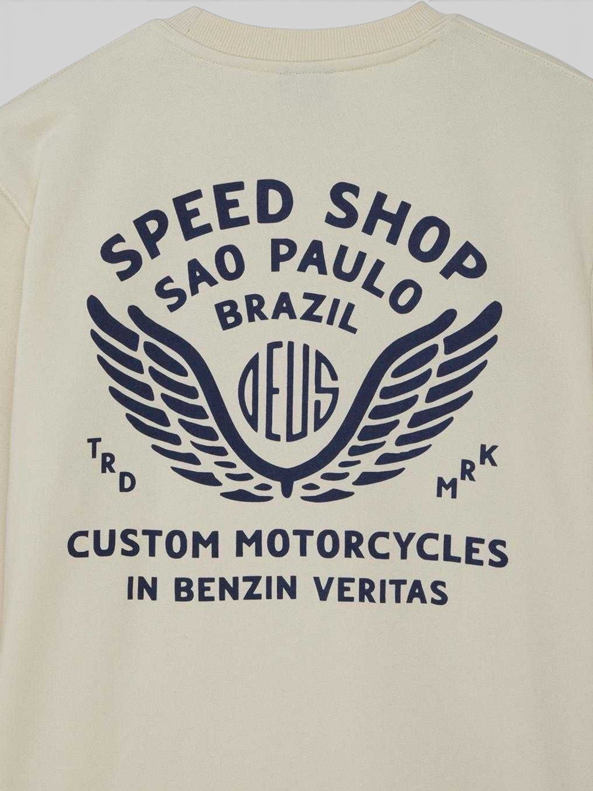Baffle Haus Munificence crew fleece in dirty white with navy blue Speed Shop Sao Paulo graphic print on the back