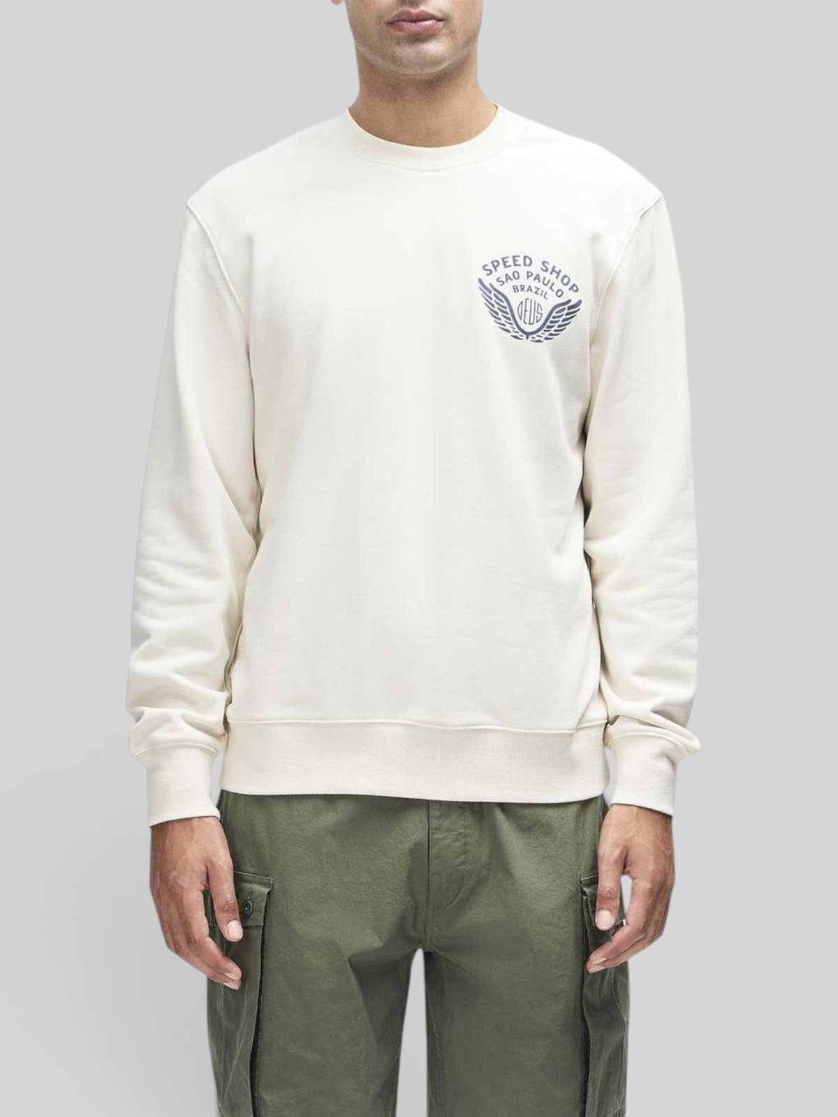 Baffle Haus Munificence crew fleece in dirty white with chest graphic print, ribbed neck, and boxy fit