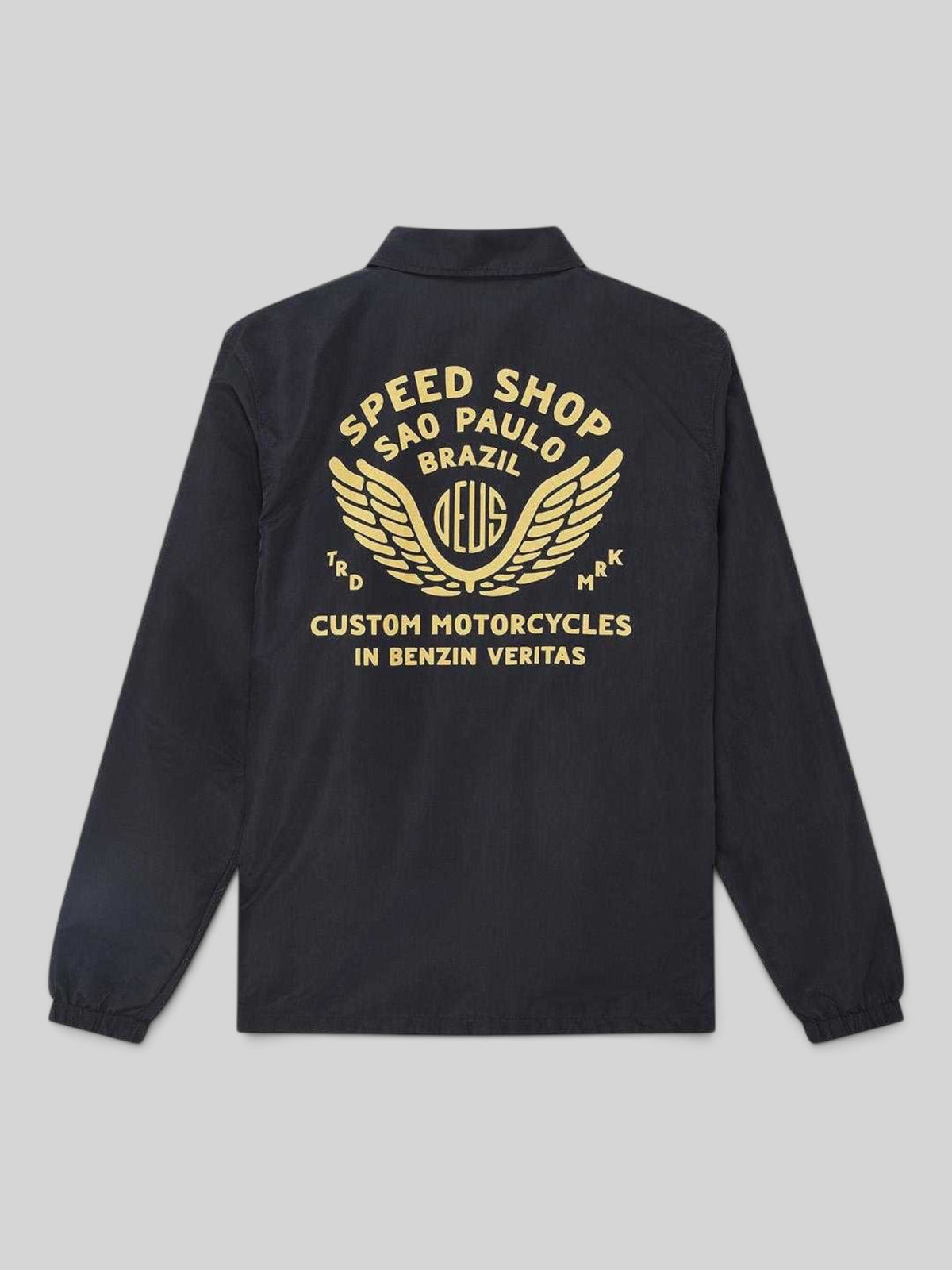 Baffle Haus Munificence nylon coach jacket in black with yellow graphic print on the back