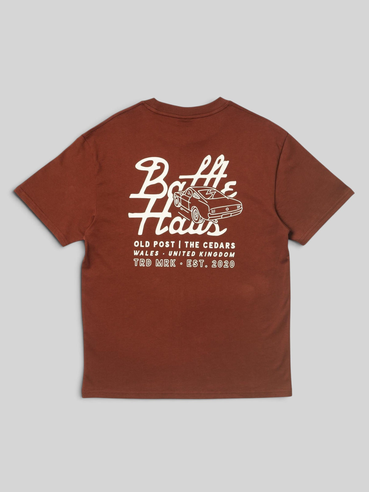 Baffle Haus Mustang Tee in cocoa brown cotton with white graphic print on the back featuring a classic car design