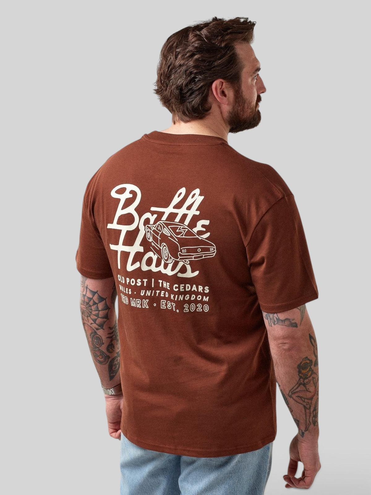Baffle Haus Mustang tee in cocoa brown cotton with white back graphic of a classic car and brand typography