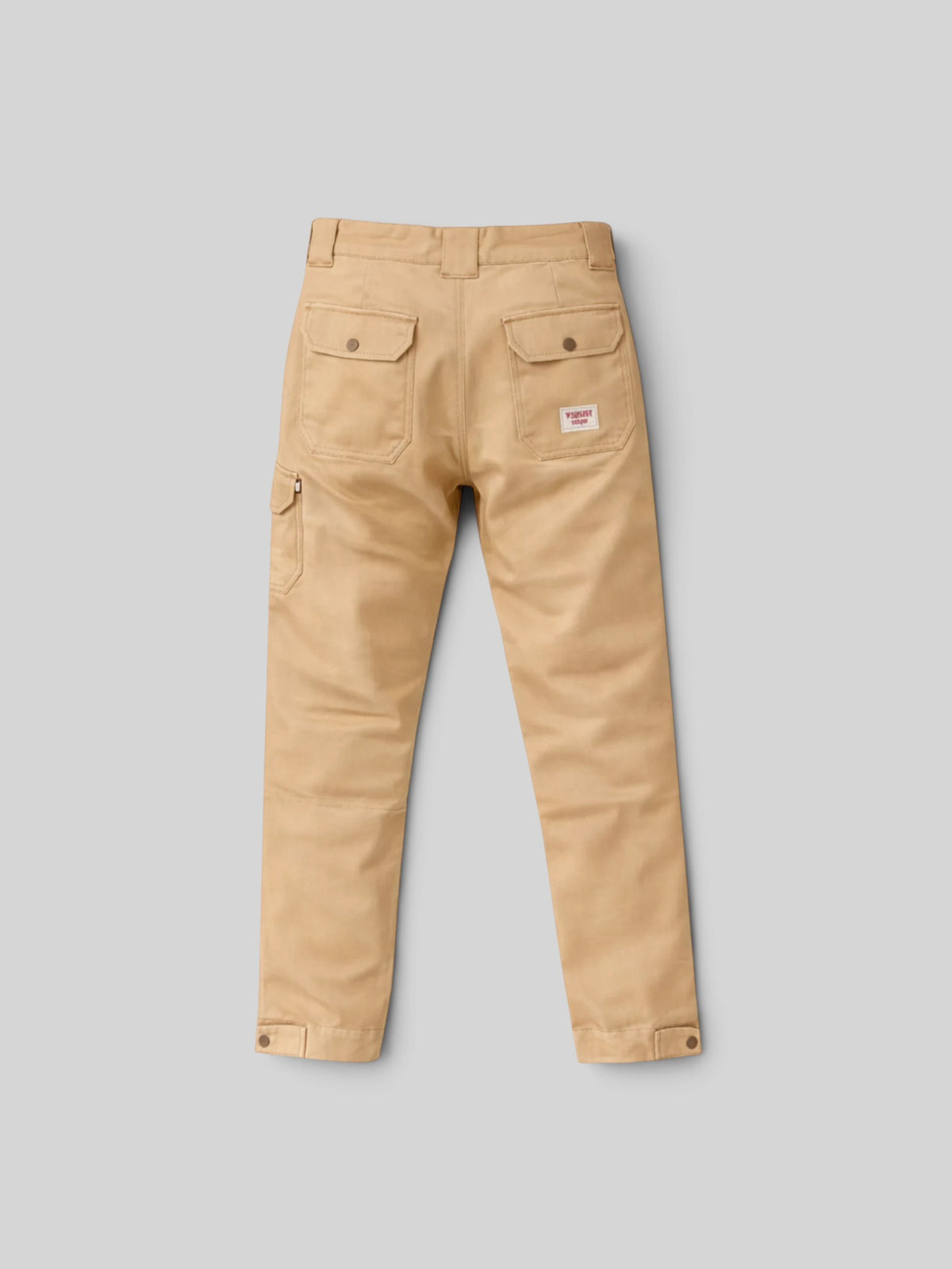 Baffle Haus Overland cargo motorcycle trousers in mustard reinforced cotton with back patch pockets and ankle buttons.