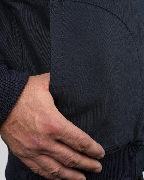 Baffle Haus 1942 N1 Deck ZIP Jacket in dark blue cotton jungle cloth with a side pocket and wool knit cuff detail