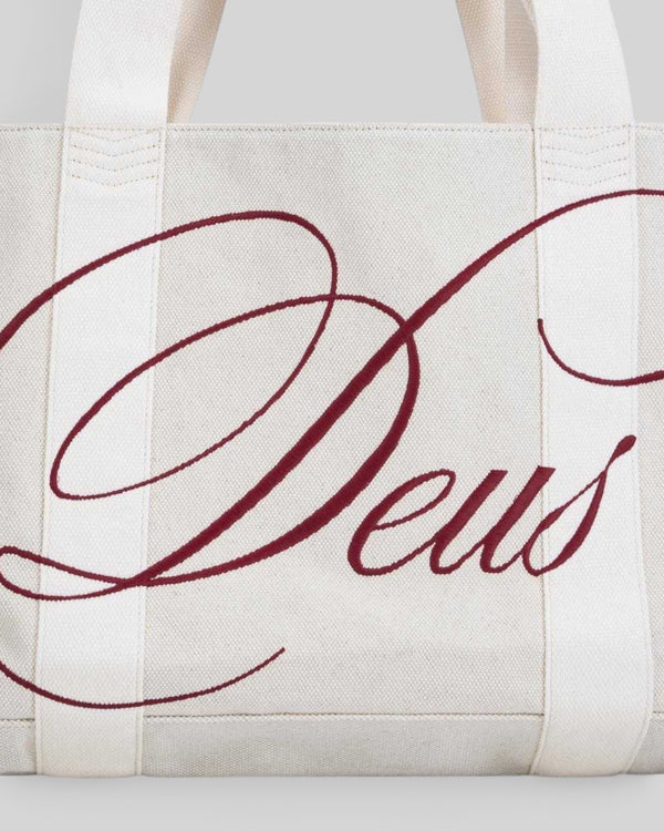 Baffle Haus Fabrizia Cavas tote in natural heavyweight cotton canvas with red cursive logo embroidery detail