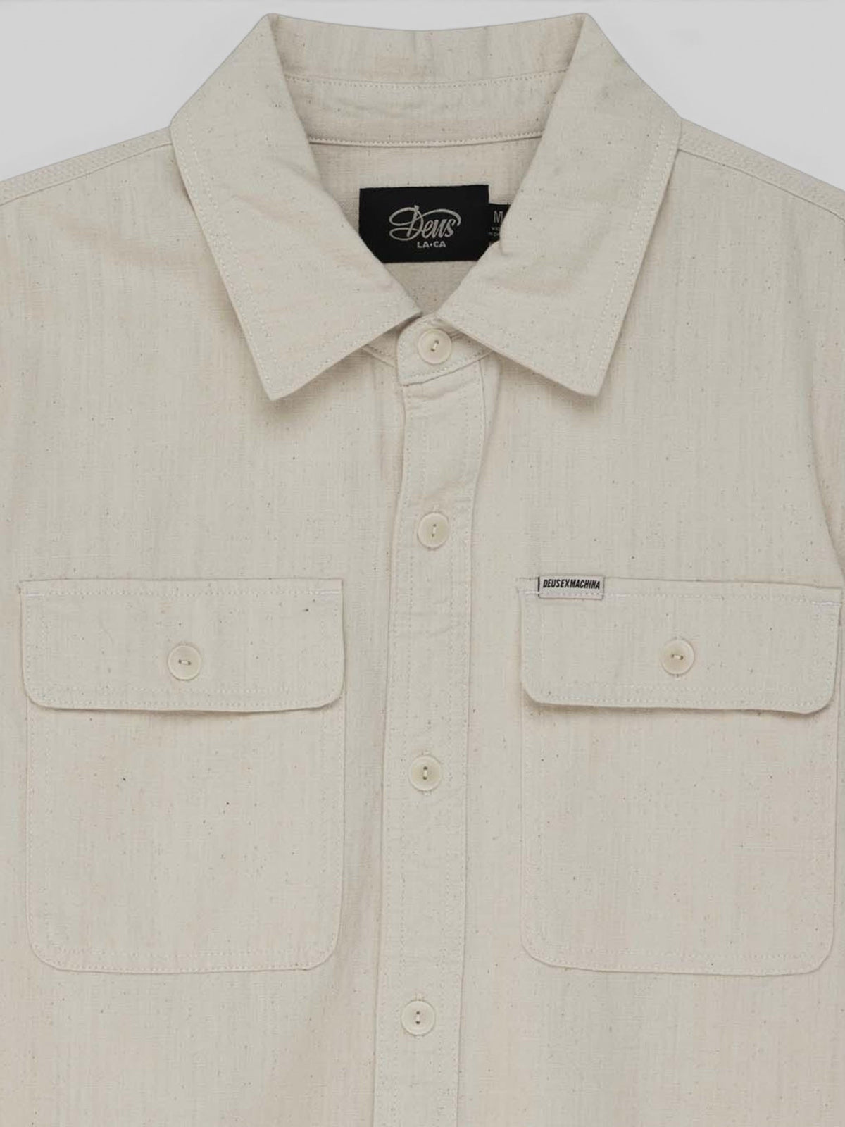 Baffle Haus Vacay chambray over shirt in natural cotton with chest flap pockets and corozo nut button closure