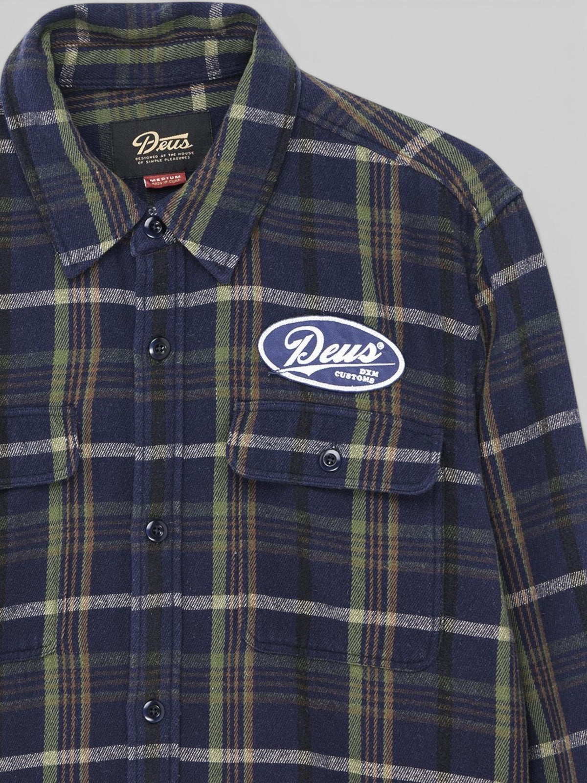 Baffle Haus navy brushed cotton flannel check shirt with chest pockets and Deus embroidered patch detail