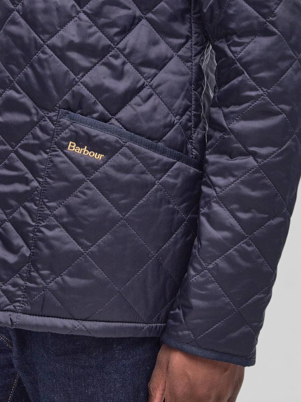 Baffle Haus Heritage Liddesdale quilted jacket in classic navy with signature diamond pattern and embroidered pocket