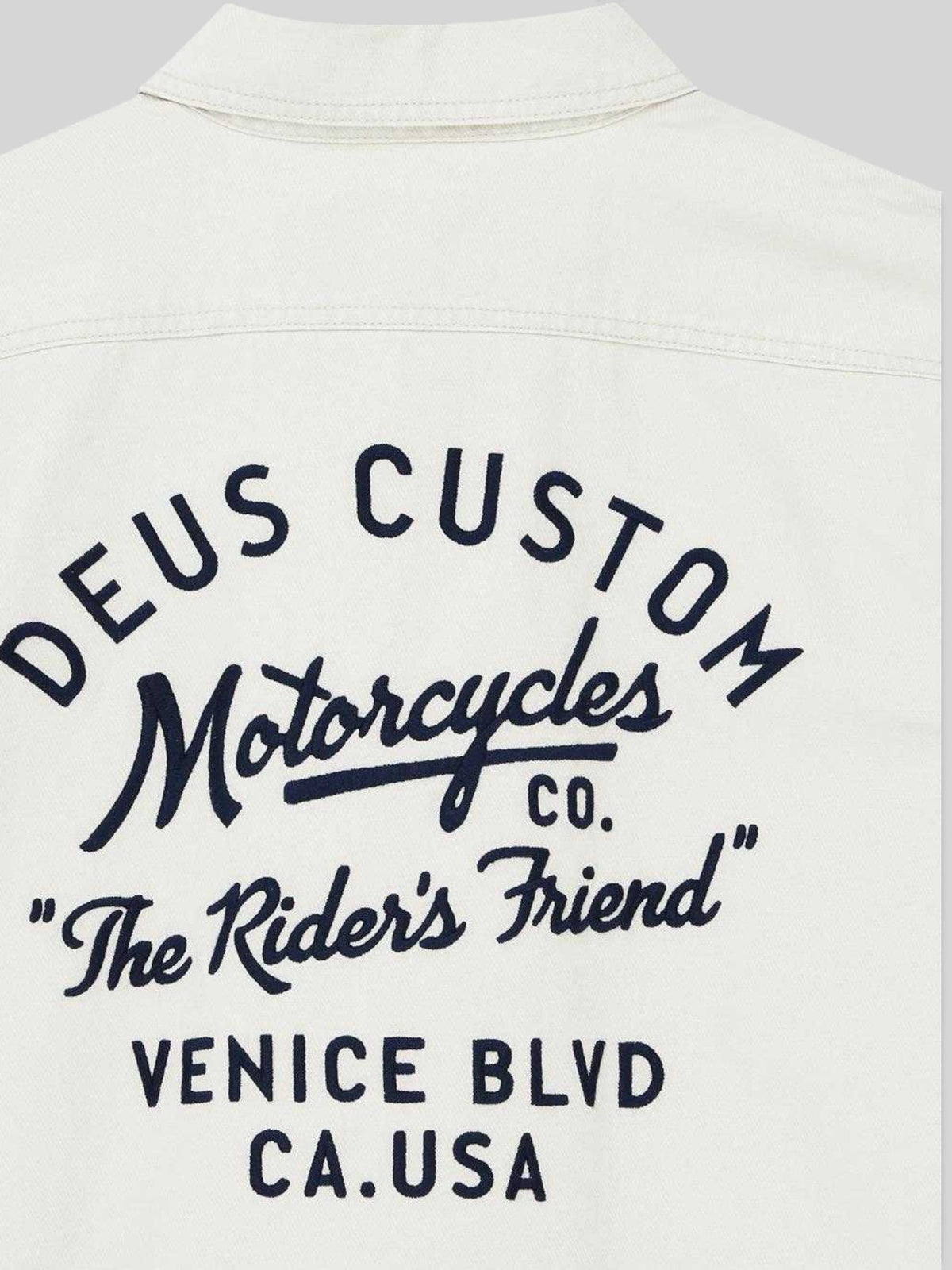 Baffle Haus Nomad shirt in dirty white cotton twill featuring black embroidered Deus Custom Motorcycles back art
