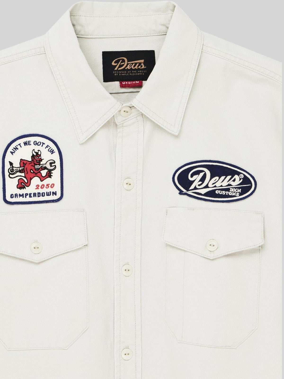 Baffle Haus Nomad shirt in dirty white cotton twill with embroidered patches and chest pockets
