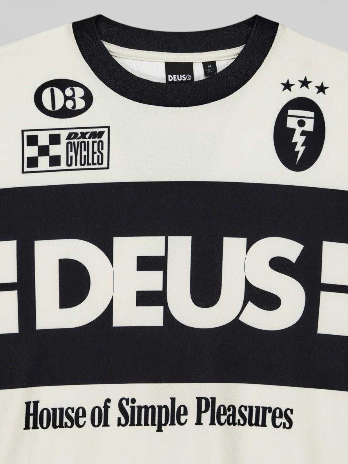 Baffle Haus Off Road MX Jersey 2 in dirty white with black graphic prints and 90s motocross inspired branding.