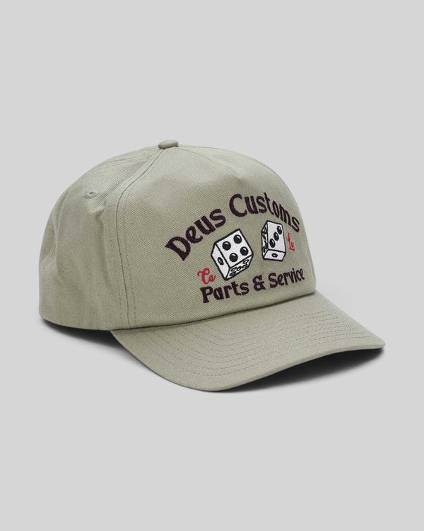 Baffle Haus olive green cotton twill cap with vintage-inspired pinch front and embroidered dice artwork