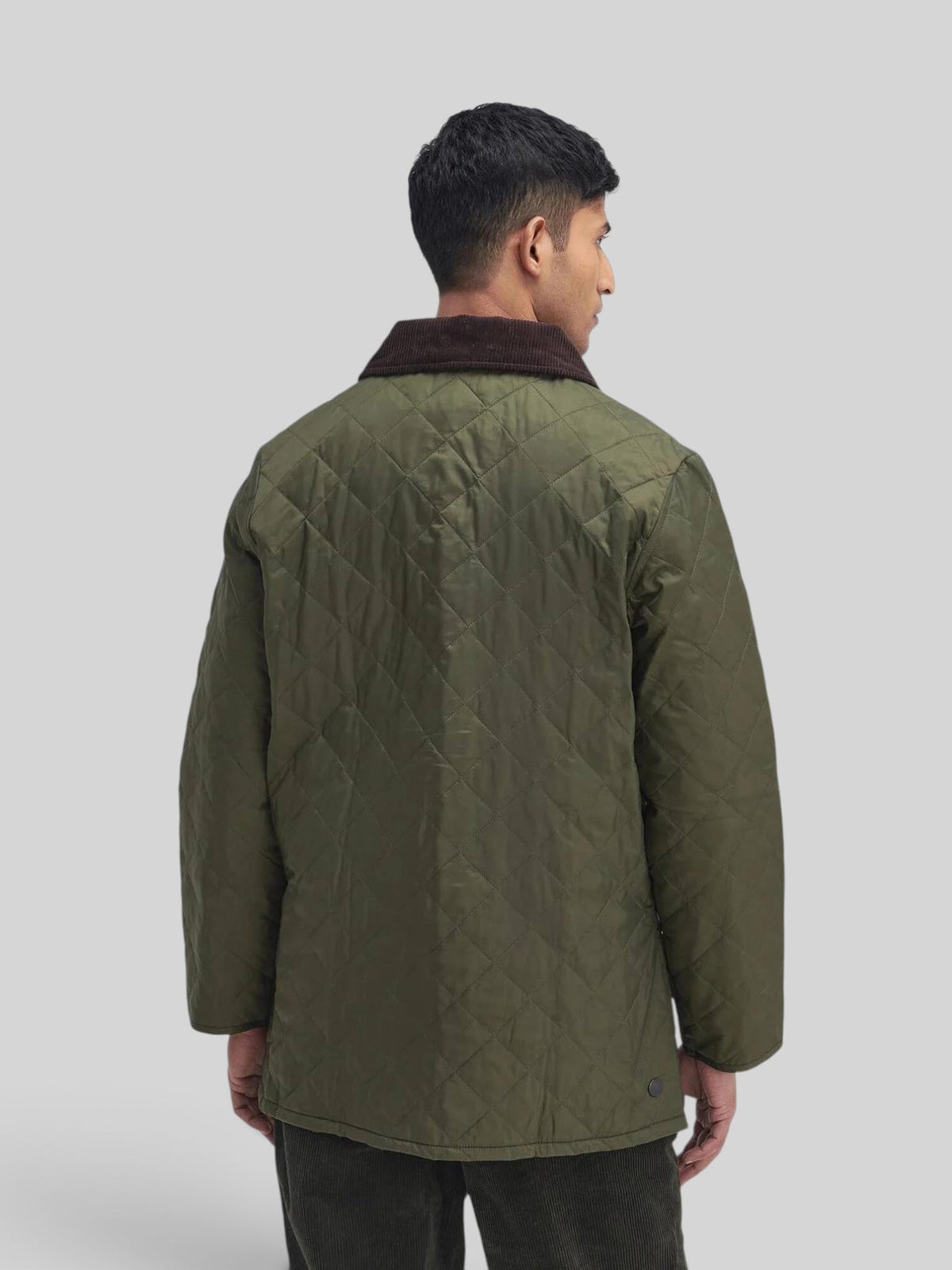 Baffle Haus Heritage Liddesdale olive quilted jacket with diamond pattern and brown corduroy collar, back view