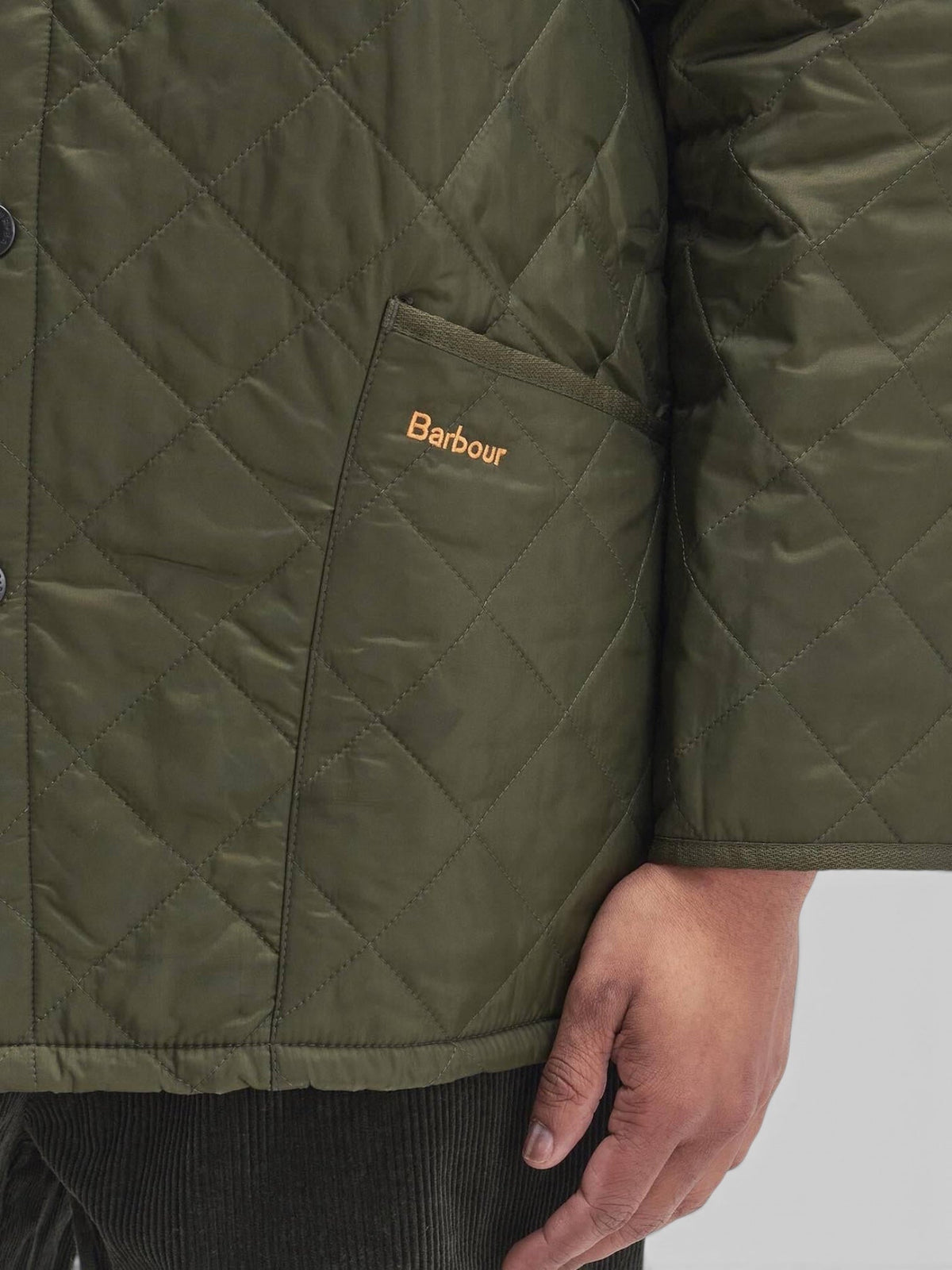 Baffle Haus Heritage Liddesdale olive green quilted jacket with diamond pattern and embroidered logo on pocket