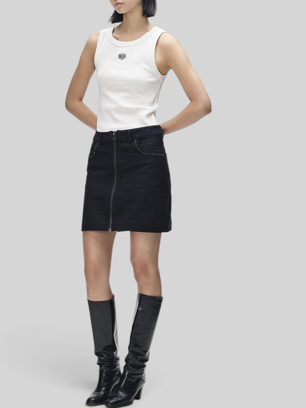 Baffle Haus Outlaw Zip Mini Skirt in black moleskin with studded pocket detail and exposed front zipper