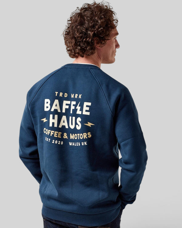 Model wearing a Baffle Haus pageant blue heavyweight cotton blend sweatshirt with Coffee & Motors back graphic print