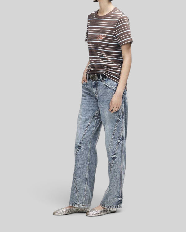 Baffle Haus Pierre stripe tee in java brown and baby blue with chest pocket and embroidery, worn with blue jeans