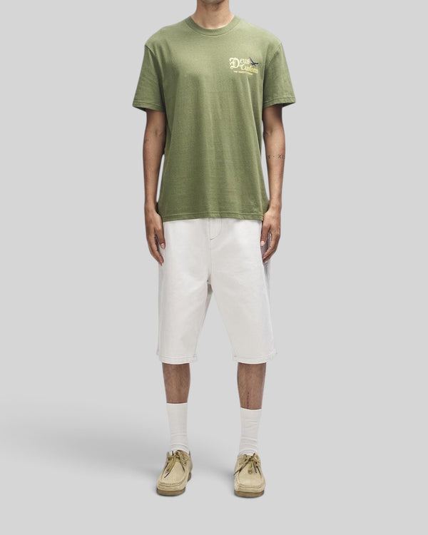 Baffle Haus Beep-Beep Tee in pine green, a box-fit short sleeve shirt made from recycled cotton and polyester.