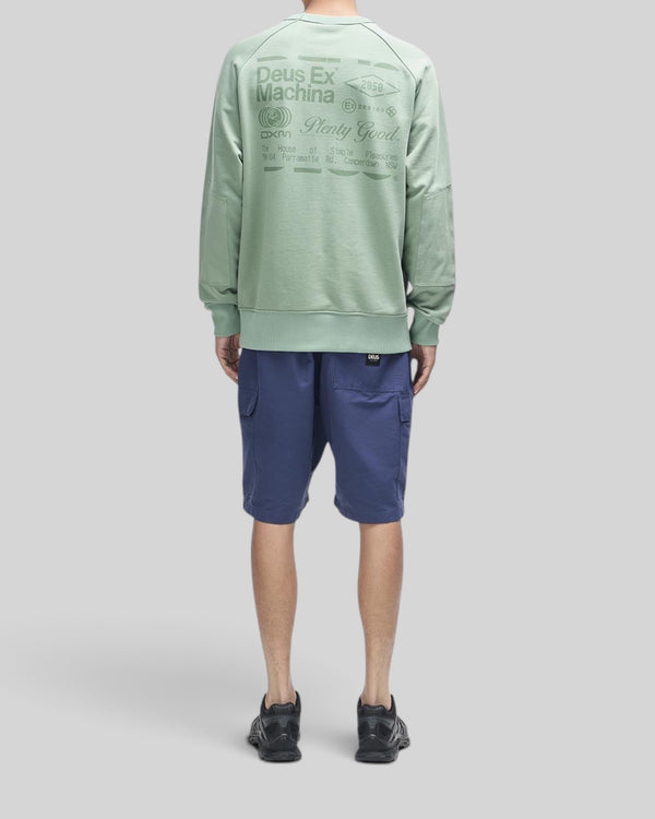 Baffle Haus Plenty Good crew neck fleece in loden frost green with back graphic print and nylon sleeve panels